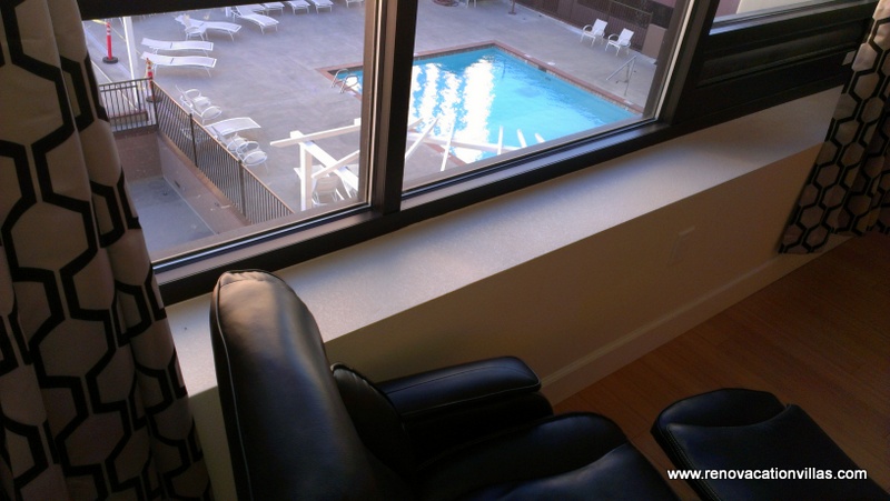 Conmmunity Pool View over Living Room Window